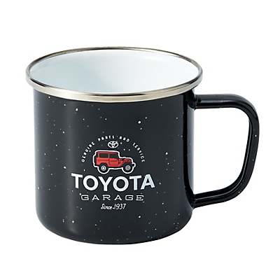 Black enamel mug with Toyota Garage logo on a white background